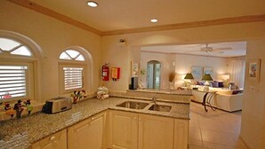 Penthouse | Private kitchen | Full-sized fridge, microwave, oven, stovetop - Sugar Hill Tennis Village B306 by Altman (Holetown)