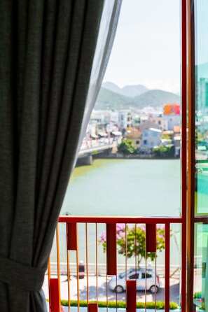 Deluxe Twin Room with River & Mountain View | Balcony view - Moonlight Bay Hotel (Nha Trang)