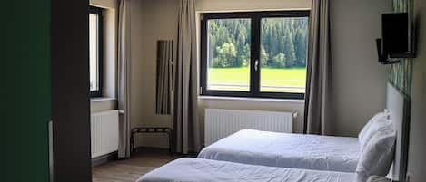 Quadruple Room | Premium bedding, in-room safe, individually decorated