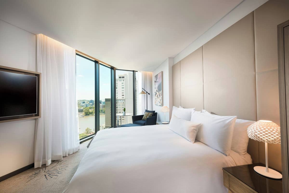 Premium Room, 1 King Bed, River View | 1 bedroom, down duvets, pillow-top beds, minibar