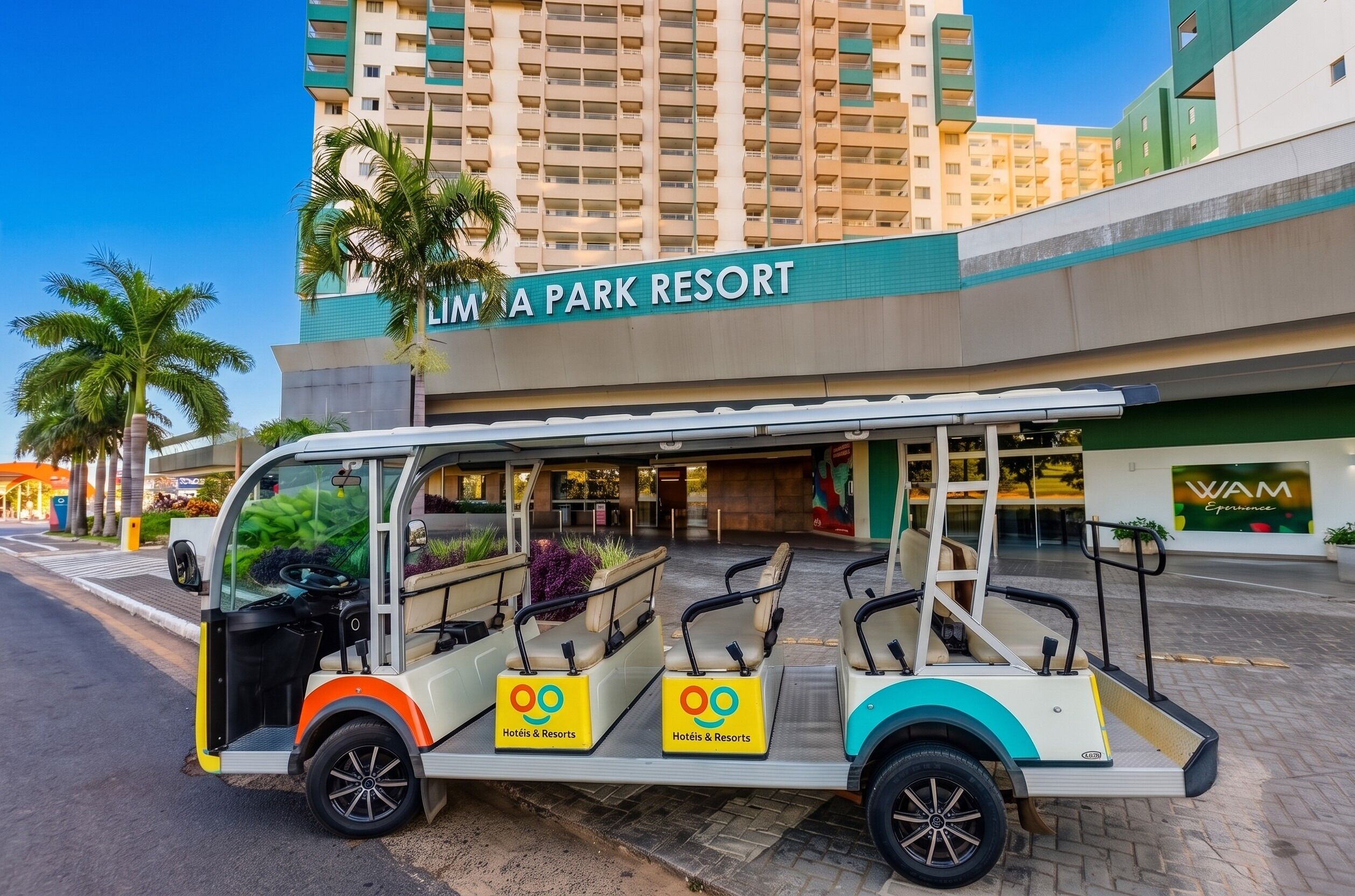 A golf cart with 'Hotels & Resorts' branding parked in front of 'MIA PARK RESORT' building.