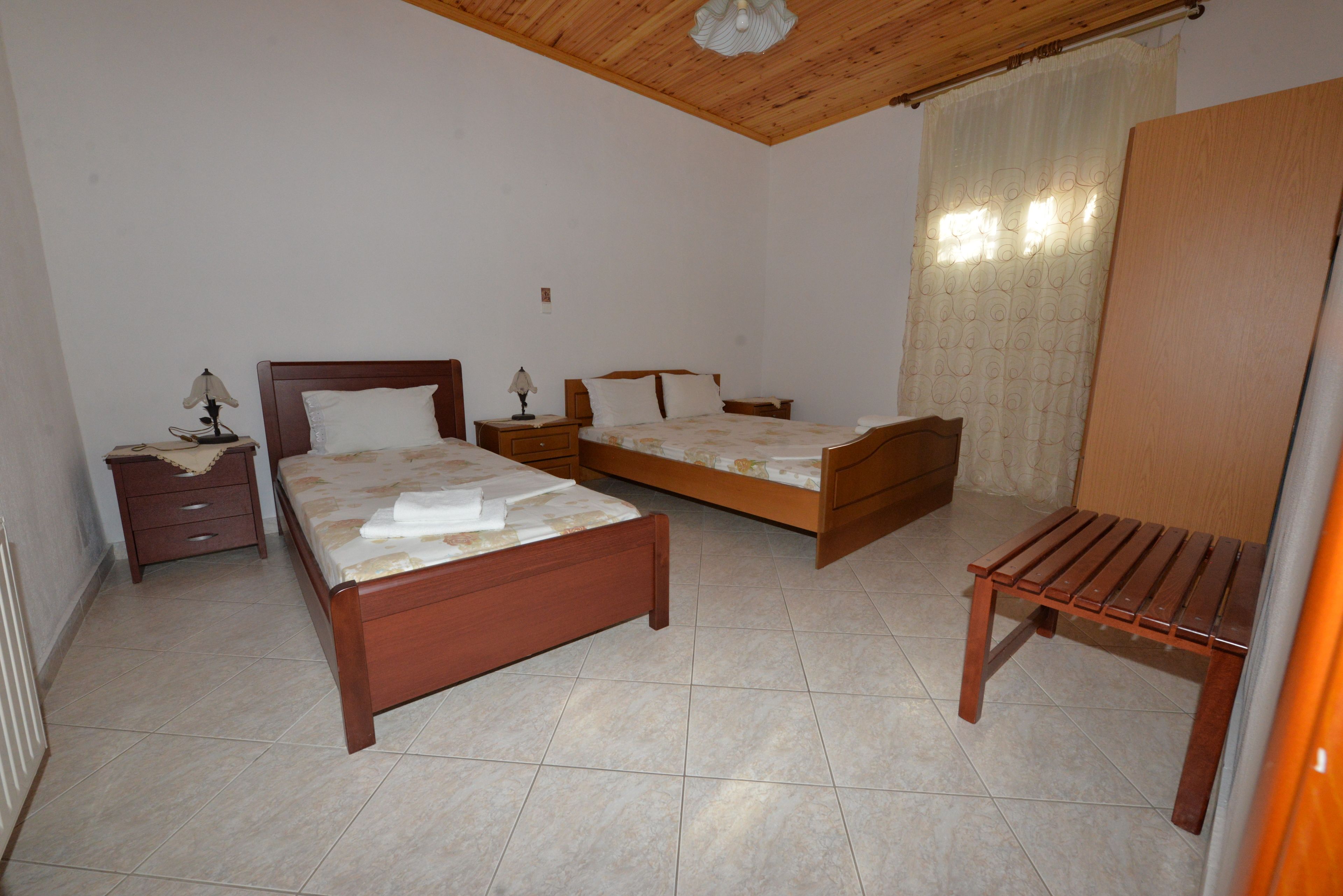 Triple Room, Non Smoking | In-room safe, blackout drapes, free WiFi, bed sheets