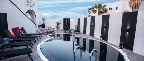 Outdoor pool, open 10:00 AM to 8:00 PM, pool umbrellas, sun loungers