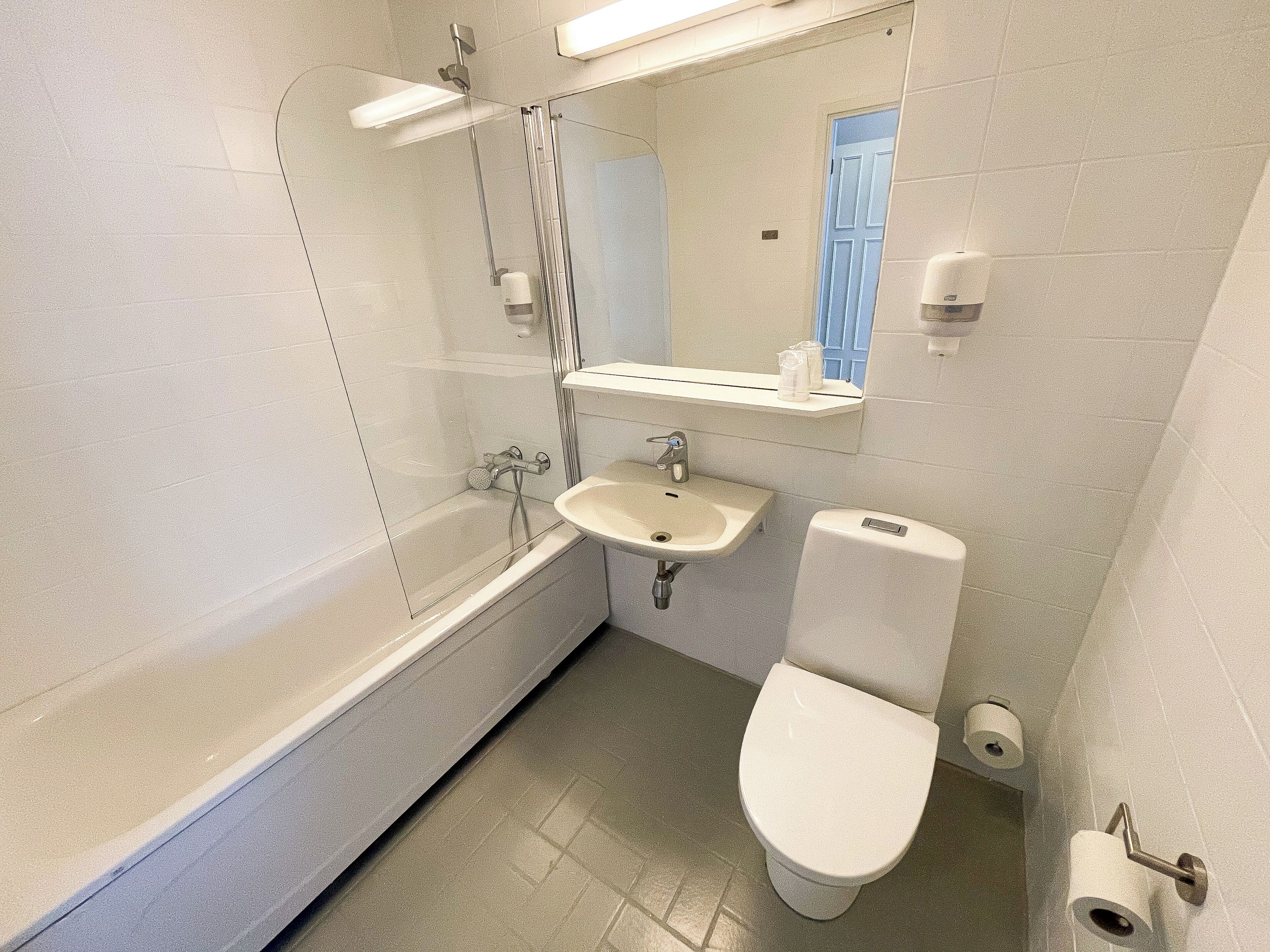 eco-friendly toiletries, hair dryer, towels