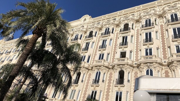 A historic building with ornate architecture, multiple balconies, and large windows. - CANNES +++ PERFECT FOR CONGRESS AND TOURISM (Cannes)