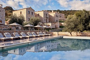 Indoor pool, seasonal outdoor pool, pool umbrellas, sun loungers
