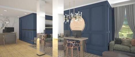 A modern living room with a blue accent wall, a round coffee table, and a dining area with a chandelier.