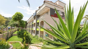 A building with a sign reading "Messa Spa & Boutique." - Rich Melissa Hotel (Kemer)
