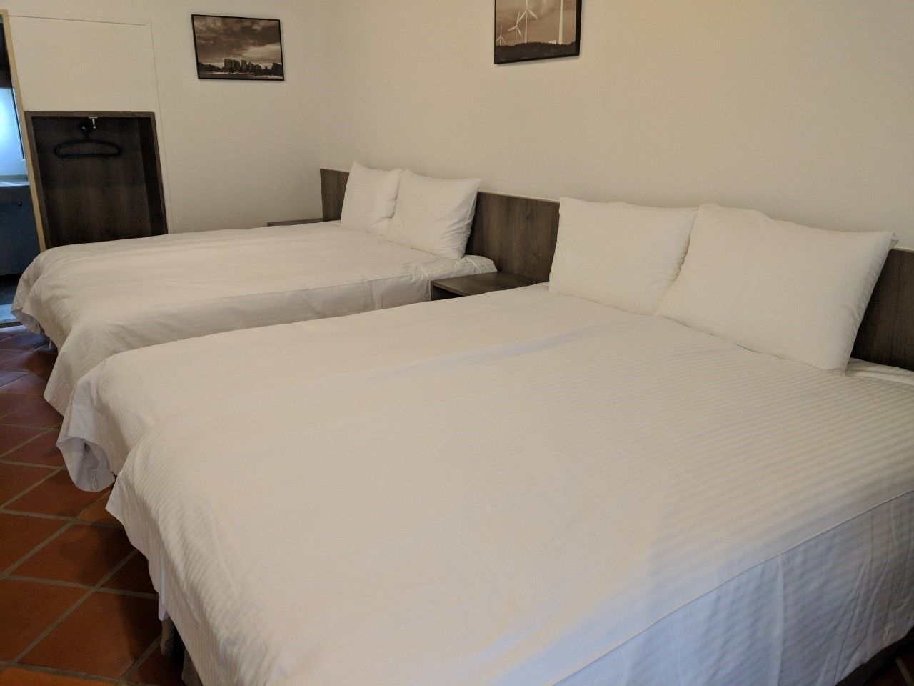 deluxe quadruple room, 2 double beds, garden view | minibar, desk, blackout curtains, soundproofing
