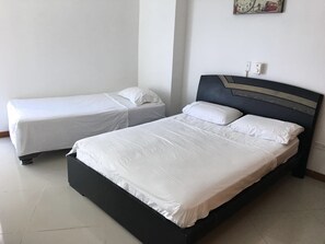 Departamento Deluxe, 2 habitaciones, vista al océano, frente al mar | 1 habitación, tabla de planchar con plancha y wifi gratis 
