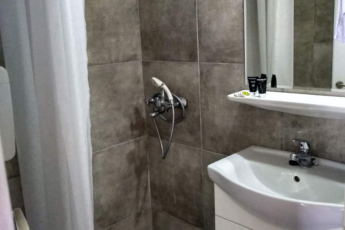 Shower, free toiletries, hair dryer, towels