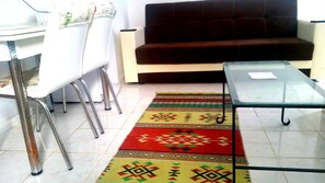 Standard Triple Room, 1 Bedroom, Garden View | Living area | LCD TV, MP3 dock - Jungle Apart Hotel (Bodrum)