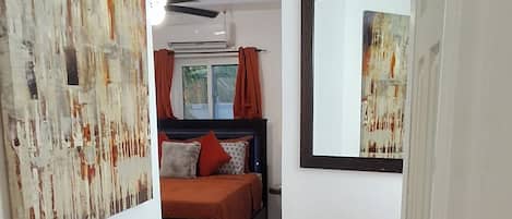 Minibar, desk, laptop workspace, iron/ironing board