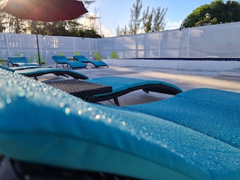 Pool (outdoor) at Bell At The Airport Suites - Adults Only