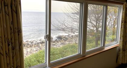 Condominium Seafront Moon and Sand