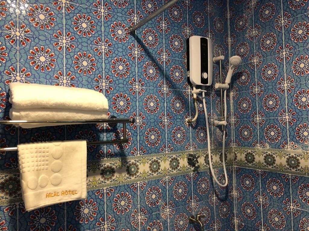 family double room | bathroom | shower, rainfall showerhead, free toiletries, slippers