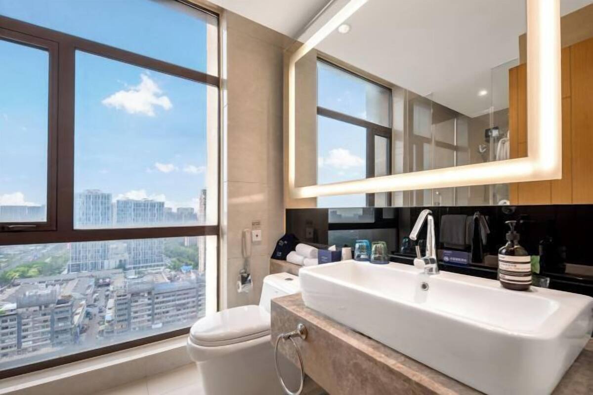 Cabezal de ducha tipo lluvia, artículos de tocador gratuitos