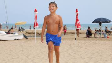 Private beach, sun loungers, beach umbrellas, beach bar