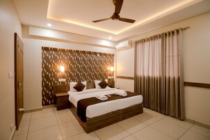 Deluxe Double or Twin Room (AC) | Desk, laptop workspace, blackout drapes, free WiFi