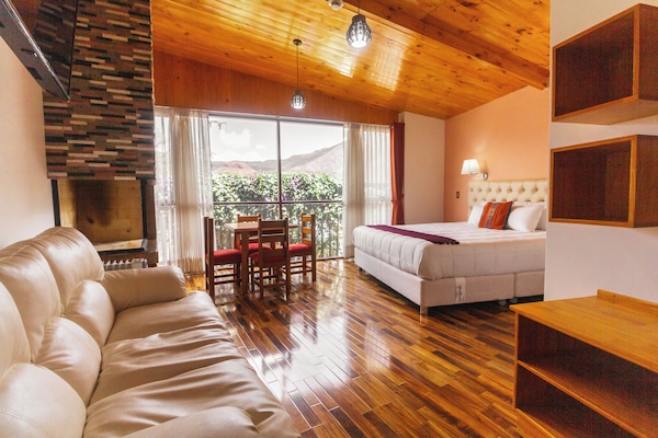 Phòng, quang cảnh núi (Suite vista a la montaña con chimenea) | 1 phòng ngủ, bộ trải giường bằng vải cotton Ai Cập