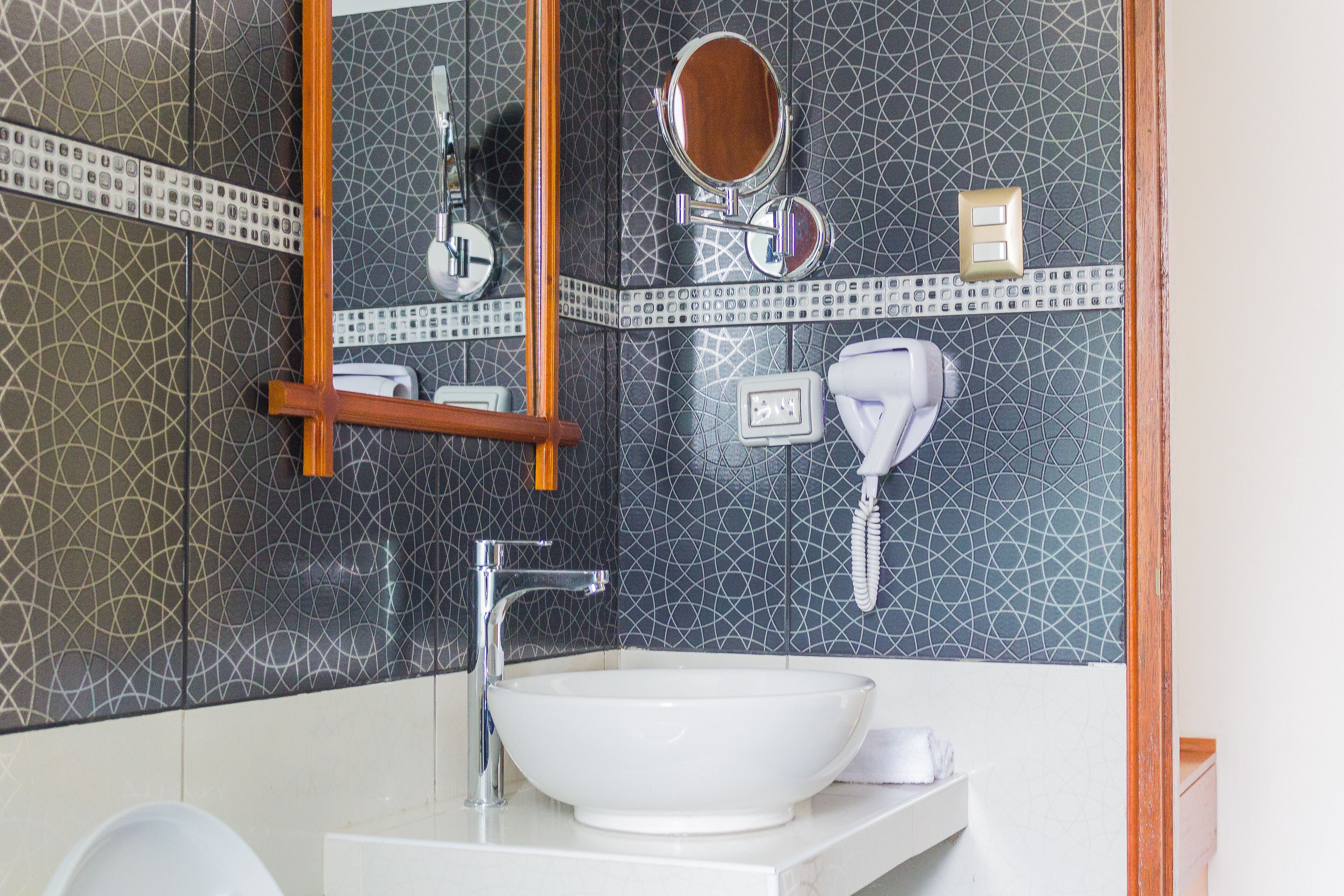 superior twin room | bathroom | shower, rainfall showerhead, free toiletries, hair dryer