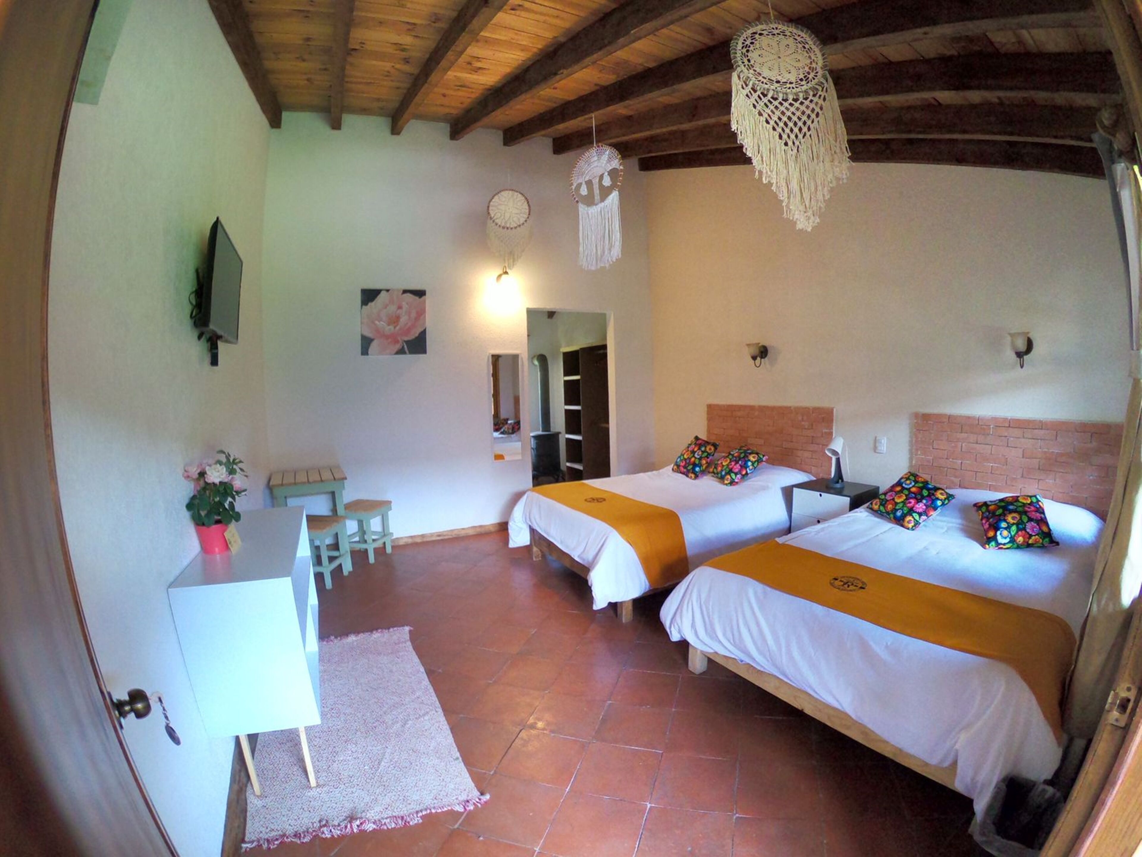 premium quadruple room, 2 queen beds, accessible, garden view | 1 bedroom, desk, soundproofing, iron/ironing board