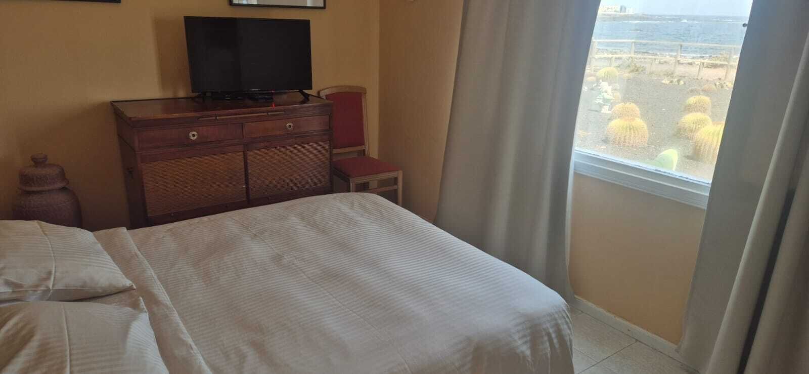 Habitación doble, vistas al mar | Minibar, caja fuerte, cunas gratuitas y camas supletorias