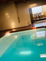 Indoor pool, sun loungers