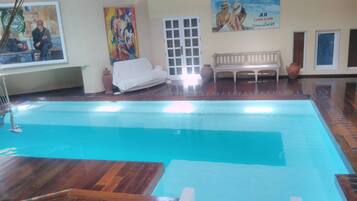 Indoor pool, sun loungers