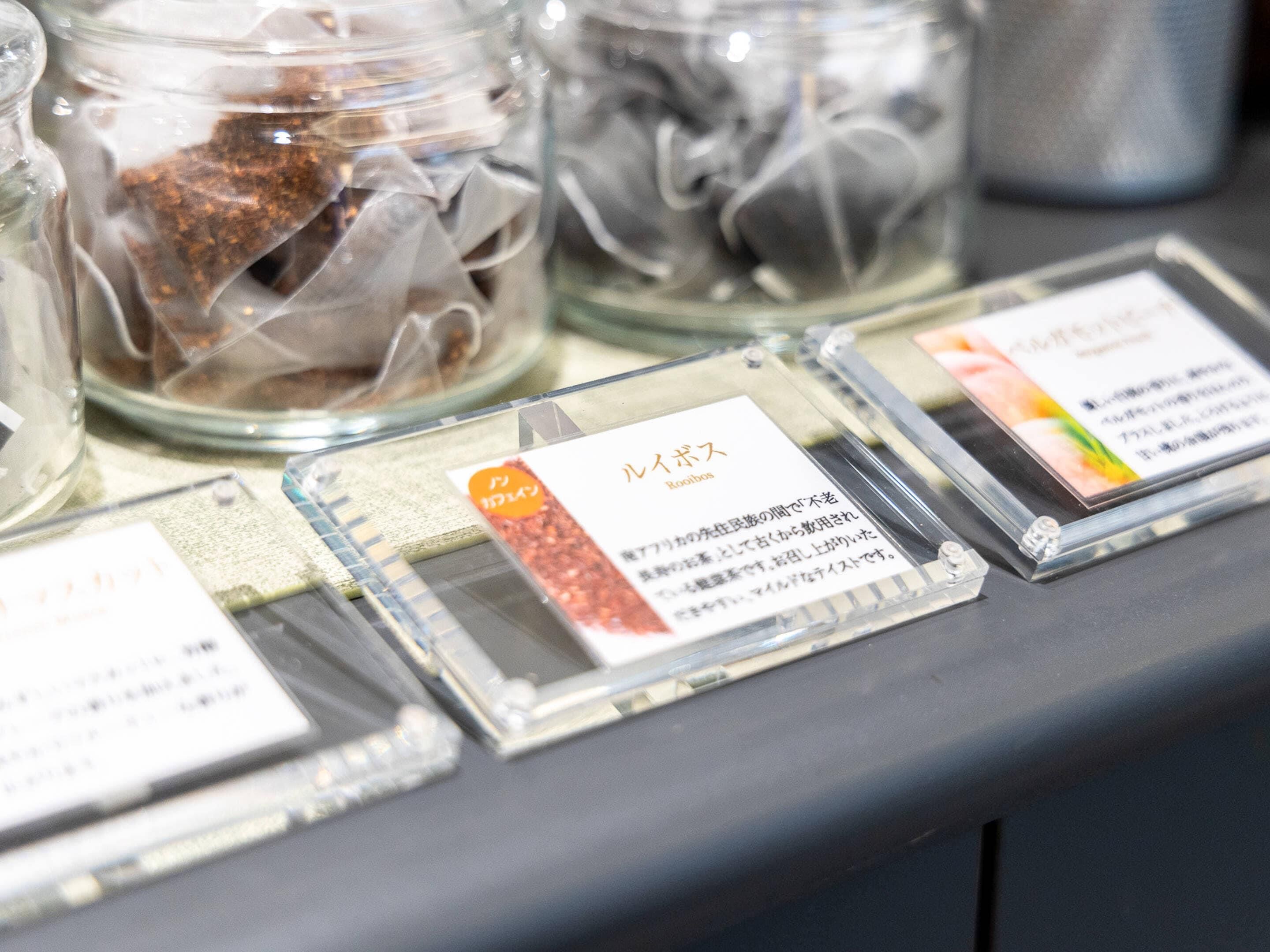 A display of packaged food items with labels in a retail setting.