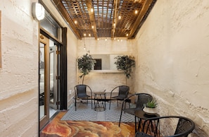 Deluxe suite, Meerdere bedden, terras, op benedenverdieping | Terras