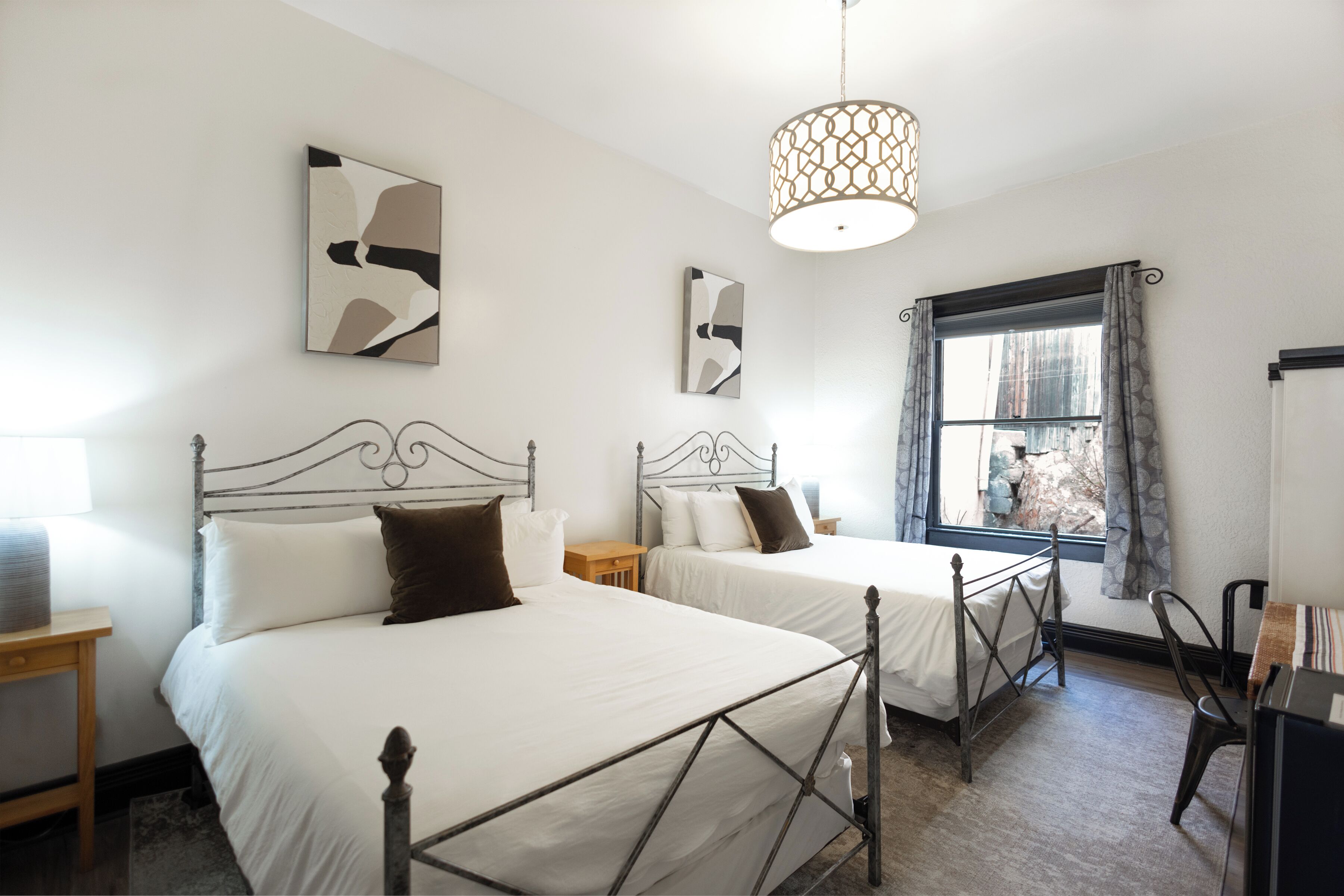 deluxe room, 2 queen beds | premium bedding, down duvets, individually decorated