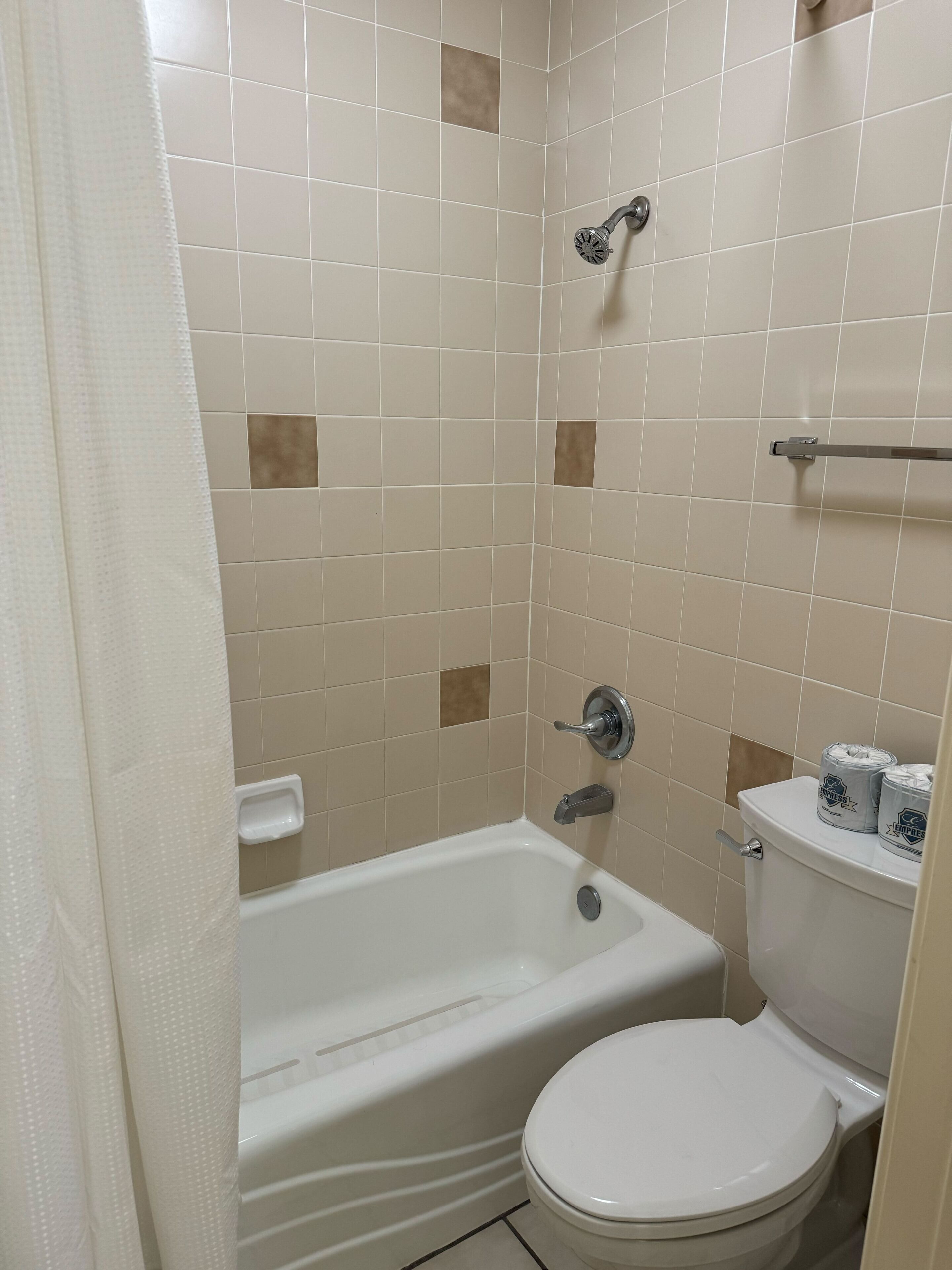 combined shower/bathtub, free toiletries, hair dryer, bathrobes