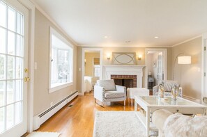 Smart TV, fireplace, DVD player, books