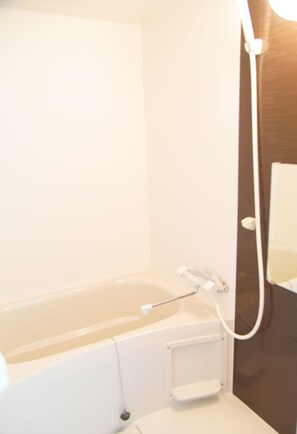 Separate tub and shower, free toiletries, slippers, towels