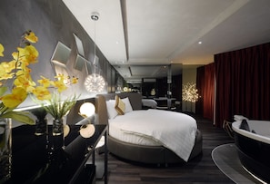 Signature Room | Minibar, desk, blackout drapes, soundproofing