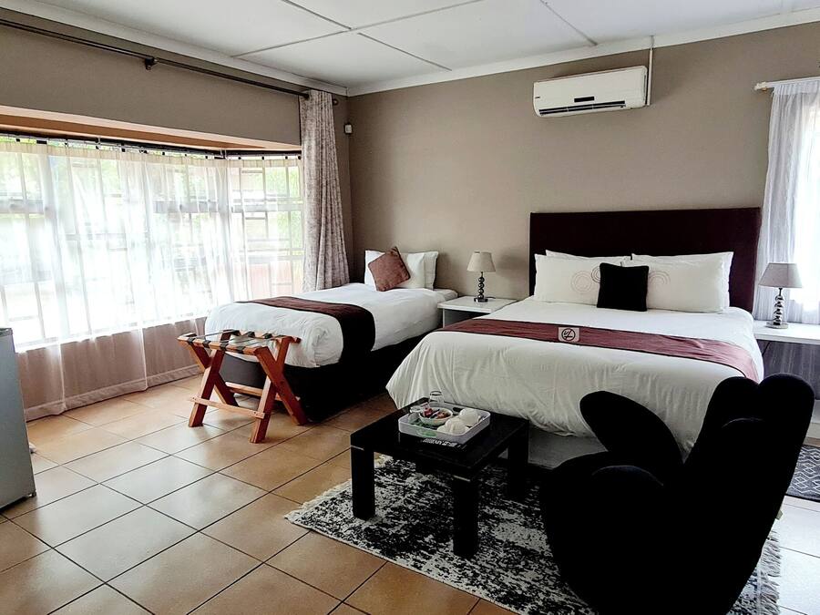 1 غرفة نوم وأغطية فراش متميزة وميني بار ومكواة/لوح كي