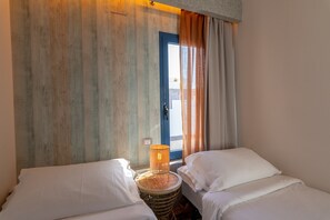 2 slaapkamers, een kluis op de kamer, een strijkplank/strijkijzer