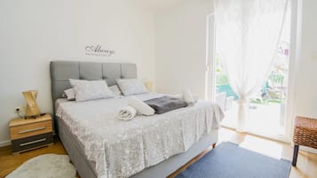 Superior Apartment, 1 Bedroom, Terrace, Garden View | Down duvets, desk, soundproofing, iron/ironing board