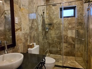 Shower, free toiletries, hair dryer, slippers