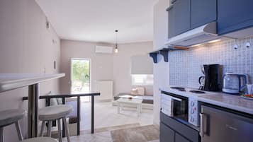 Departamento estándar, 1 habitación, para no fumadores | Área de sala de estar
