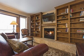 Flat-screen TV, fireplace