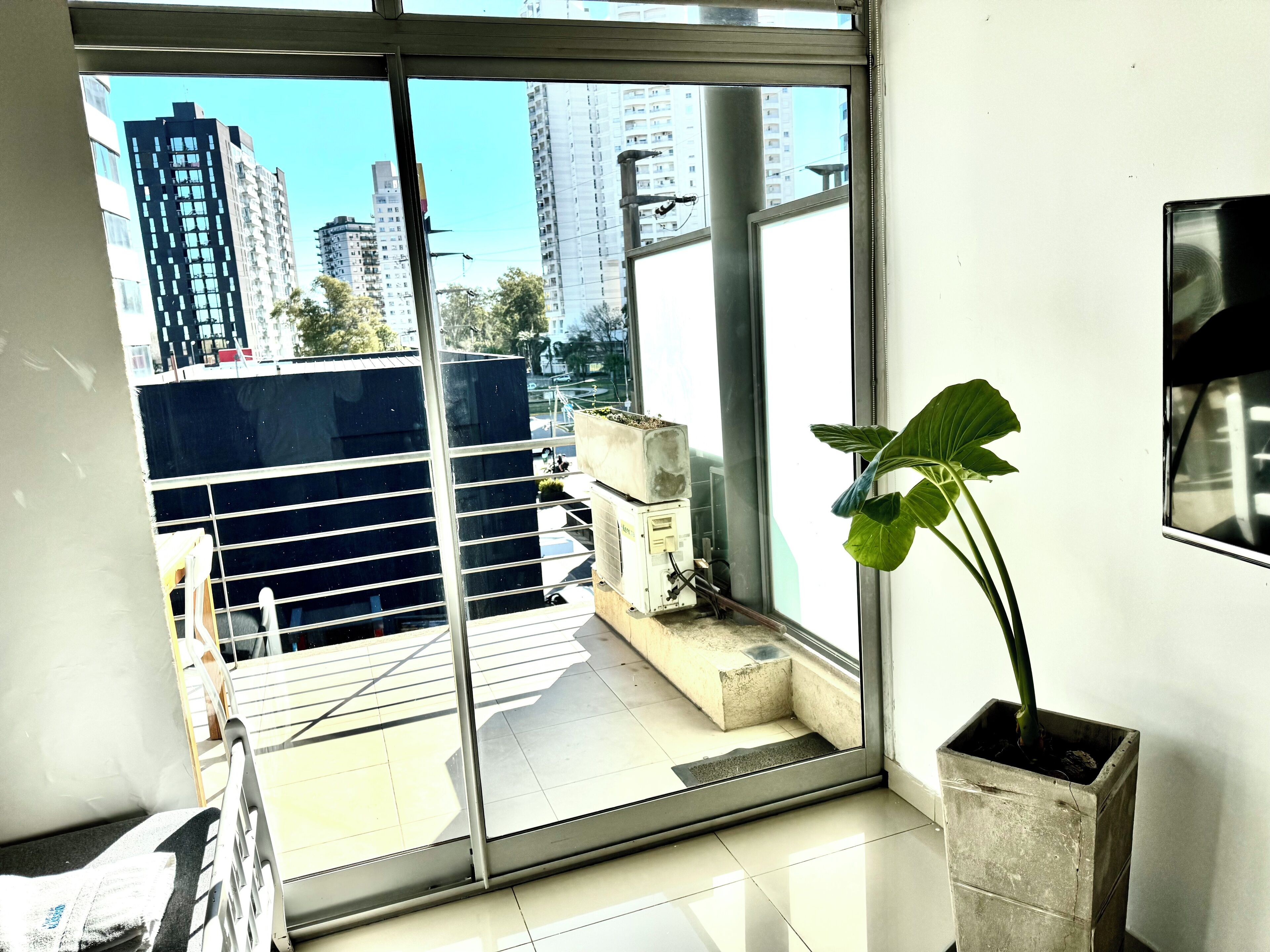 Dúplex Deluxe (Departamento Alassio) | Sala d'estar | Televisor de pantalla plana 