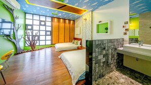 A room with two beds, a large window, a tree mural, and a bathroom with a stone wall. - Cat Lazy B&B (Luodong)