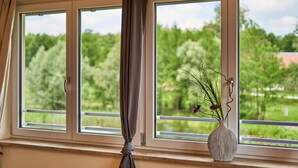 Family Apartment, 2 Bedrooms, Balcony, Lake View (Laerche) | Living area | Flat-screen TV, heated floors - Wanderreitstation Gut Mischenried (Wessling)