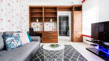 Superior Apartment, 1 Bedroom | Living room | Flat-screen TV