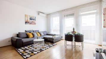Superior Apartment, 2 Bedrooms | Living area | Flat-screen TV