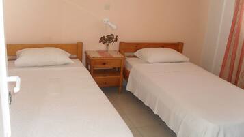 Apartment, 1 Bedroom, Sea View, Ground Floor | Desk, iron/ironing board, free WiFi, bed sheets