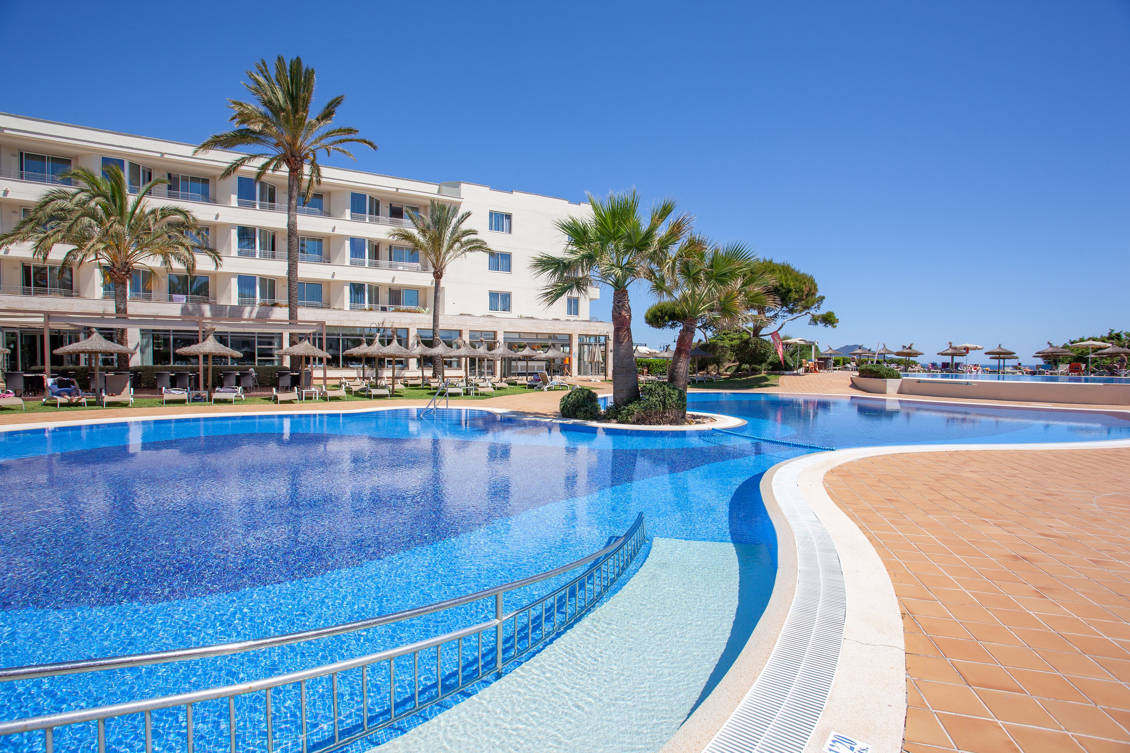 indoor pool, 2 outdoor pools, pool umbrellas, pool loungers