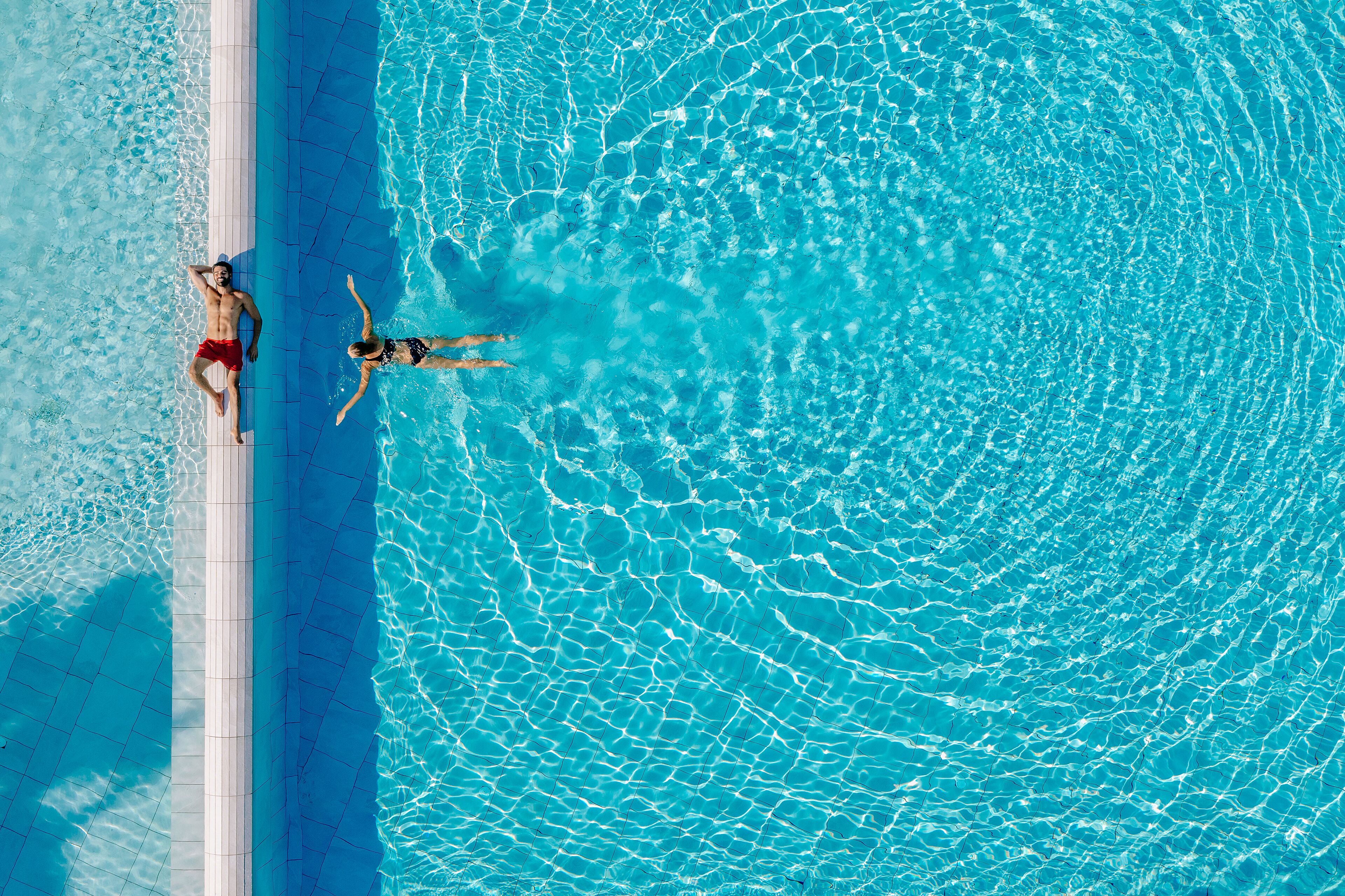 indoor pool, outdoor pool, pool umbrellas, pool loungers